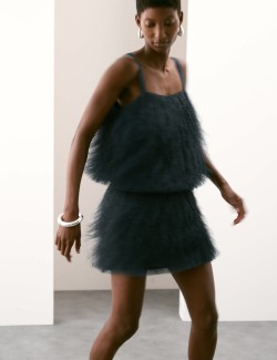 Minisukně do A s třásněmi