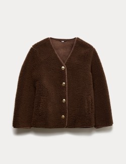 Volná bunda z umělé kožešiny se zlatým knoflíkem