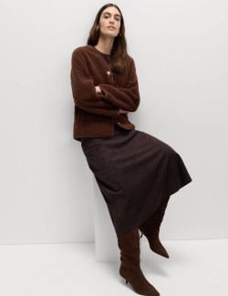 Volná bunda z umělé kožešiny se zlatým knoflíkem