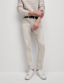 Strečové džíny úzkého střihu s 360 pružností