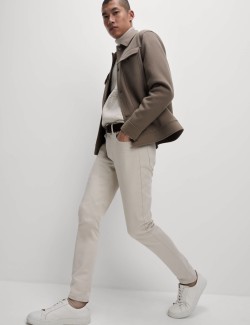 Strečové džíny úzkého střihu s 360 pružností