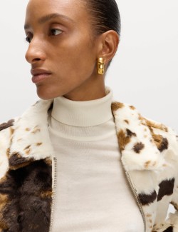 Kamioňácká bunda s umělou kožešinou a potiskem kravské kůže