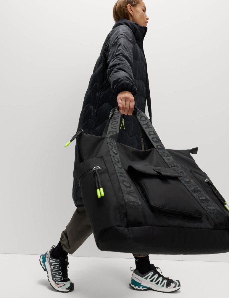 Taška s uchy a několika kapsami