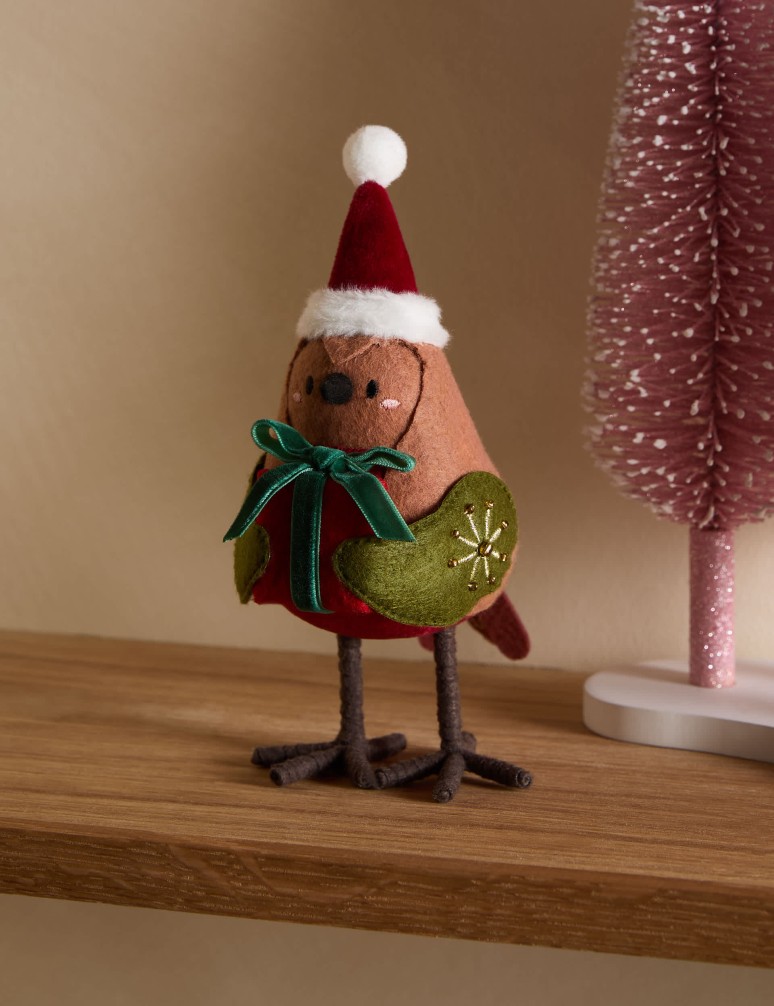 Pokojová dekorace s motivem červenky