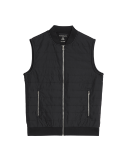 Prošívaná vesta se zapínáním na zip s technologií Stormwear™ a s vysokým podílem bavlny