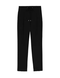 Kalhoty ke kotníkům mírně zúženého střihu se stahovacími šňůrkami