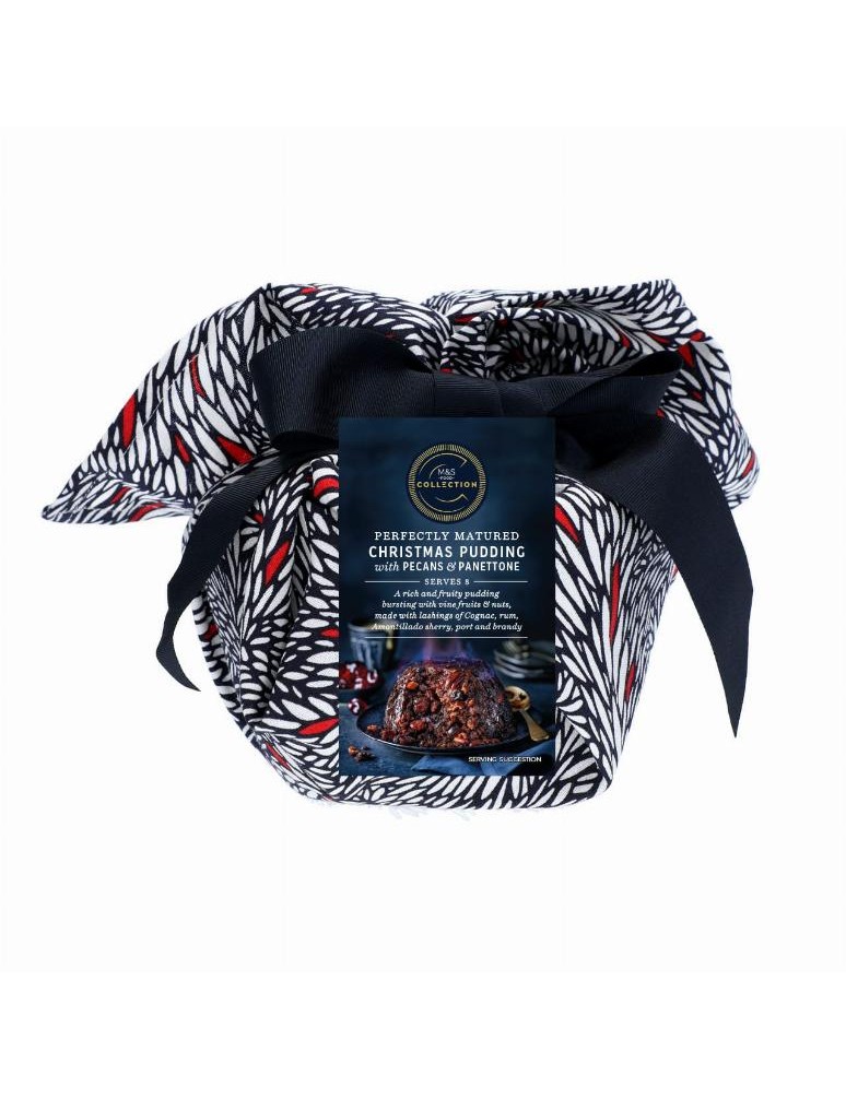 Vánoční pudink s rozinkami (30 %), ciderem (6 %), koňakem (4 %), pekanovými ořechy (4 %), rumem (3 %), panettone (3 %), sherry A