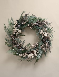 Věnec se zasněženými šiškami a osvětlením