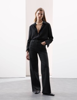 Vysoce střižené džíny s širokými nohavicemi