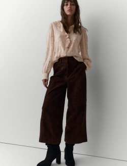 Průsvitná flitrovaná volánová košile