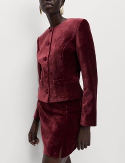 Sametová mini sukně áčkového střihu se strakatým vzorem a postranním rozparkem