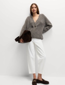 Kardigan z buklé, s knoflíky na přední straně a výstřihem do V, s obsahem vlny