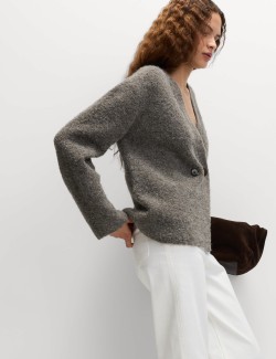 Kardigan z buklé, s knoflíky na přední straně a výstřihem do V, s obsahem vlny