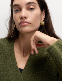 Kardigan z buklé, s knoflíky na přední straně a výstřihem do V, s obsahem vlny