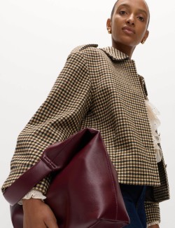 Krátká kostkovaná bunda s límcem