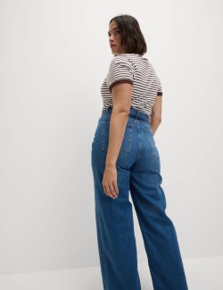 Vysoce střižené džíny s širokými nohavicemi