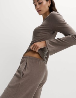 Tepláky s širokými nohavicemi