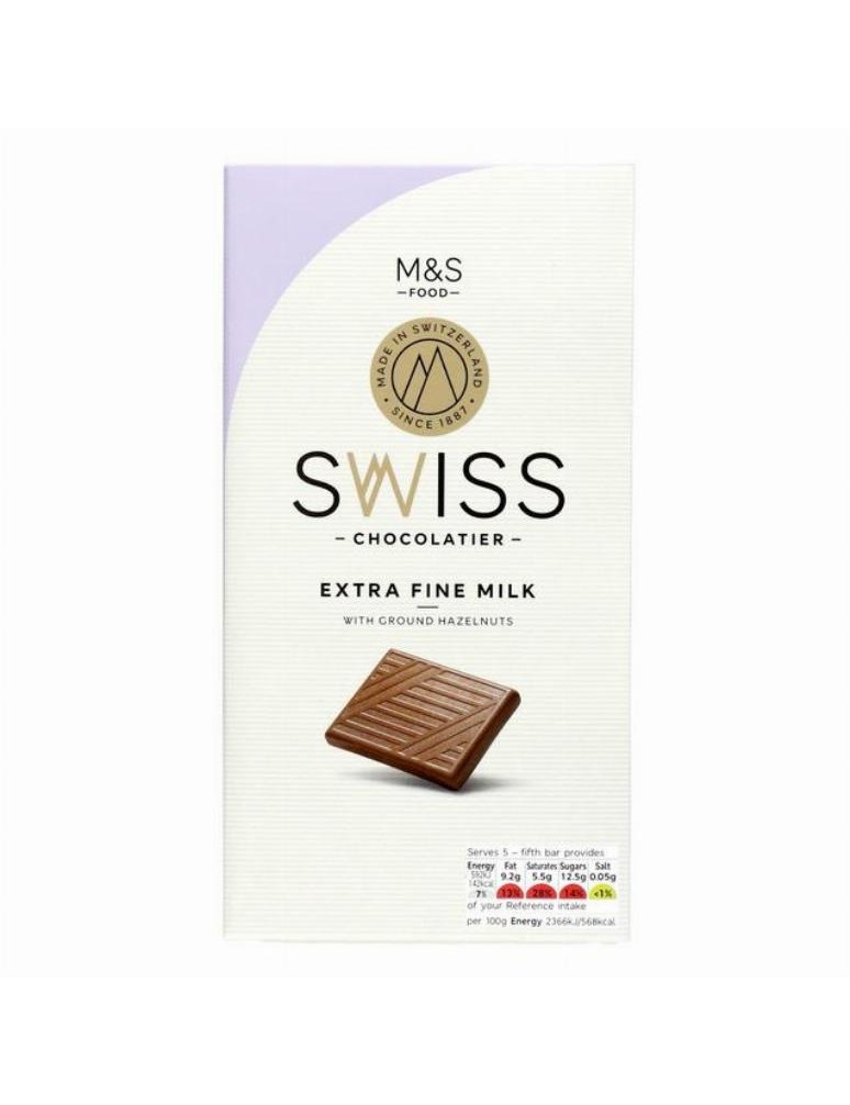 Švýcarská extra jemná mléčná čokoláda s mletými lískovými ořechy