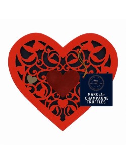 Pralinky z mléčné čokolády s náplní s Marc de Champagne obalené v krystalovém cukru