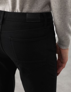 Strečové džíny úzkého střihu s 360 pružností