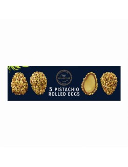 Vajíčka z mléčné čokolády plněná náplní z pistáciové pasty a bílé čokolády a obalená v kouscích pistáciových ořechů