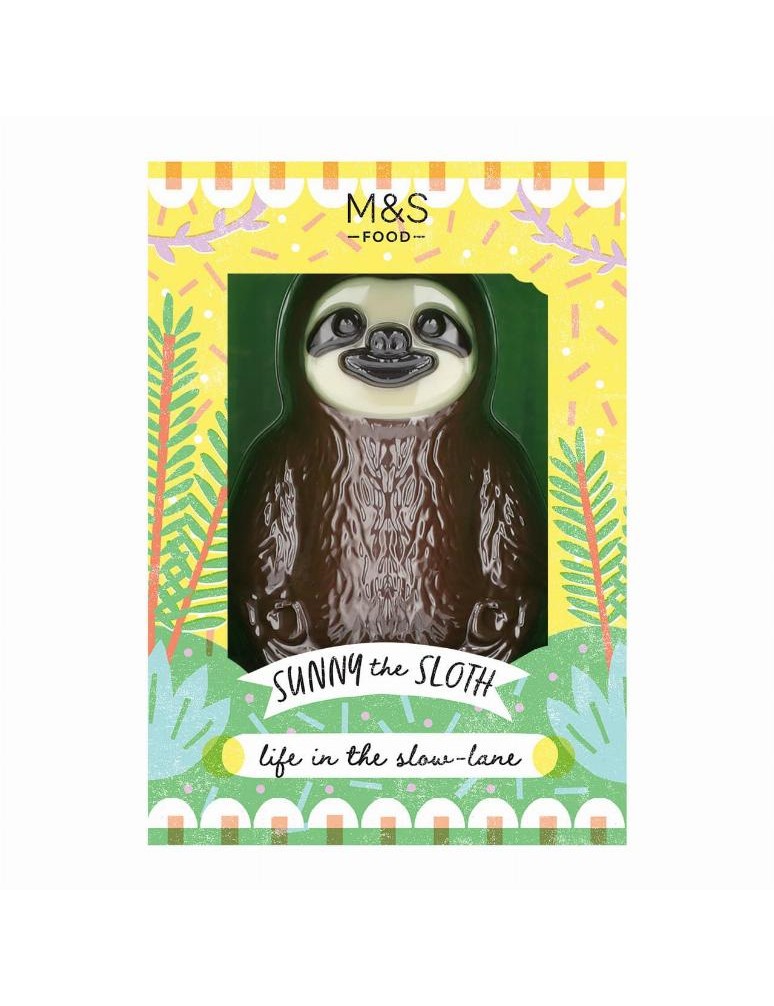 Dutá figurka z mléčné čokolády s ozdobami z bílé a hořké čokolády