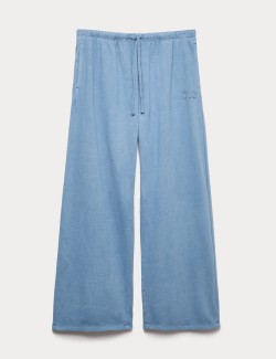 Domácí tepláky se širokými nohavicemi a vysokým podílem bavlny