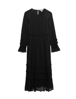 Průsvitné midi šaty se zvýrazněným pasem a volány