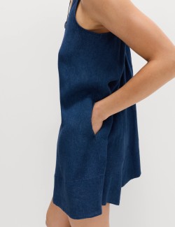 Kombinéza bez rukávů s vázáním a vysokým podílem lnu