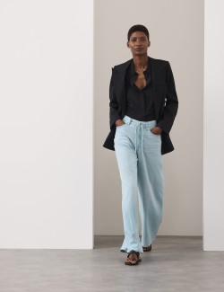 Stahovací džíny s širokými nohavicemi