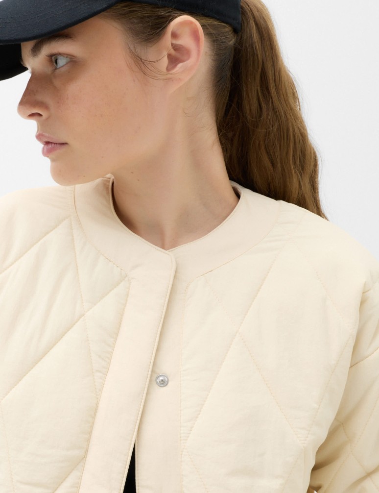 Prošívaná bunda bez límečku s technologií Stormwear™