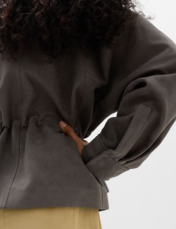 Koženková (broušená) fukční bunda s límcem a peplum volánem
