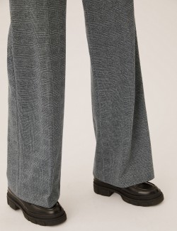 Žerzejové kostkované kalhoty s širokými nohavicemi